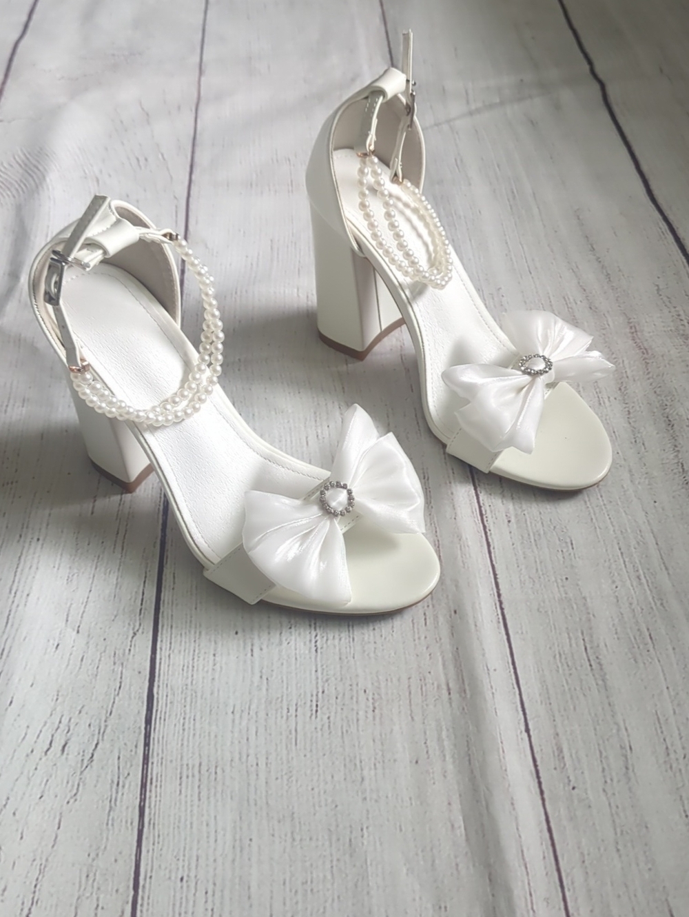 Elegant White Block Heel Sandals with Bow and Pearl Ankle Strap